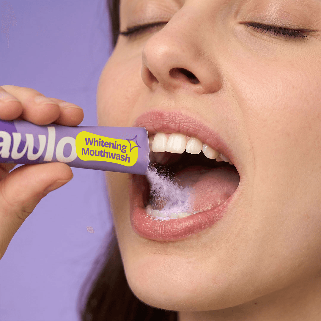 Swishing Mawlo mouthwash